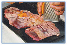 Laping al horno - untar la carne con la papaya