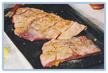 Laping al horno - untar el laping con el ajo molido y la mostaza