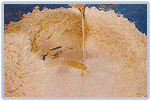 Pan de zapallo, cernir la harina