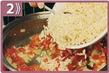 Tortilla de berenjena y arroz, incorporar chile y arroz