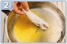 Zarzuela navideña, freír el pescado enharinado